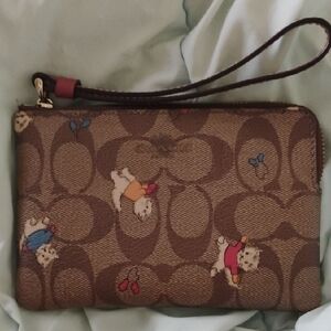 Coach Brown Wristlet with Dog Motif